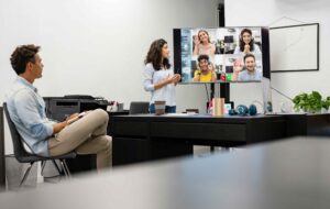 Distributed development team collaborating in real-time video call, representing nearshore staff augmentation and seamless cross-border team integration.