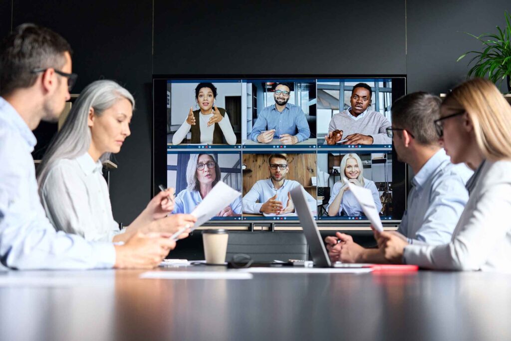 Engineering leaders evaluating remote staff augmentation candidates and nearshore development teams via video call, assessing talent for team integration and hiring decisions.